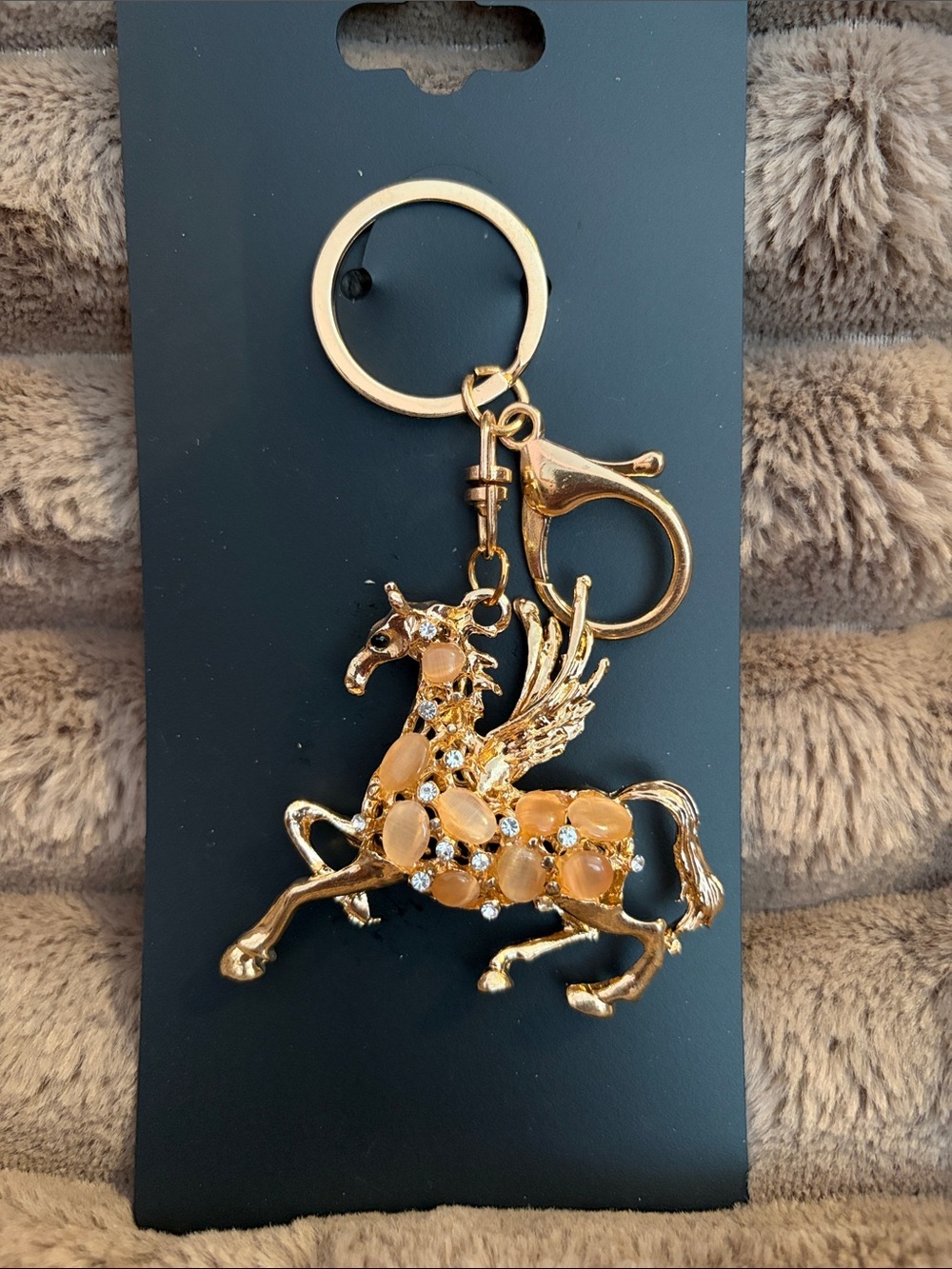 Gold Pegasus Keychain with Orange Gem Accents